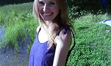 Beautiful blonde amateur bends over by the lake for outdoor doggystyle with her pretty pussy getting filled