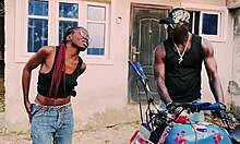 petite biker girl stands for public garage sex on bike