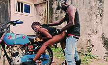 petite biker girl stands for public garage sex on bike