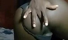 kenyan crossdresser strips clothes and probes wide asshole in solo tease