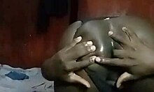 kenyan crossdresser strips clothes and probes wide asshole in solo tease