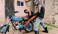 petite biker girl stands for public garage sex on bike