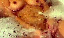 asian babe relaxes in bath vibing pussy to orgasm