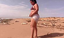 latina with huge ass gets so turned on by beach sun she fingers herself wildly in the sand