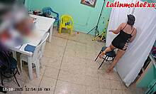 hot latina model poses sexy in lingerie backstage while producer showers nearby