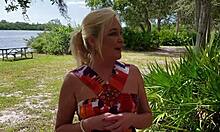 blonde milf flashes shaved pussy and pierced nipples outdoors