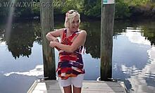 blonde milf flashes shaved pussy and pierced nipples outdoors