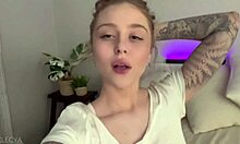 cute blonde babe spreads shaved pussy legs wide fingering her natural tits in homemade bedroom solo