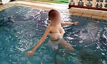 ASIAN COLLEGE CUTIE WORKS OUT LEGS AND FEET BY POOL IN TINY BIKINI!