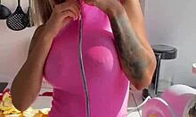 Luscious Monika Fox Strips Pink Bodysuit in Kitchen Revealing Pierced Nipples