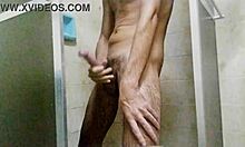 taking a hot shower n stroking my huge cock till i cum hard brazilian style