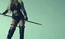 Petite Blonde Elsa Jean Poses with Sword Before Riley Anne Reveals Curvy Form