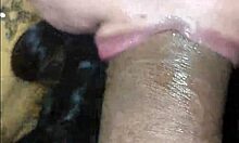 Choking hard on this massive cock while sucking deep