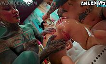 Tattooed goth pornstars get oiled up, share slick metal toys in lesbian assplay orgy