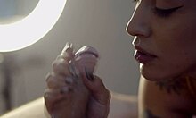 hey this teasing tattooed babe with piercing tongue gives handjob blowjob then fucks my monster cock wet