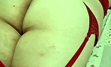 brazilian curvy beauty in lingerie poses on bed as homemade christmas amateur