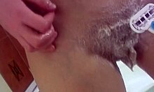 shaving my dripping wet shaved pussy smooth right in the steamy bath