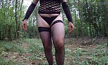 tranny babe stuffs dildo up big ass outdoors in forest