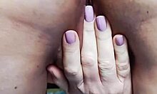 mature blonde cougar spreads shaved pussy lips flashing huge wet cunt legs wide