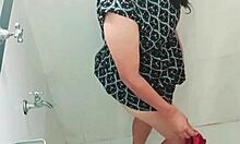 Latina housewife masturbates her natural body in steamy shower.