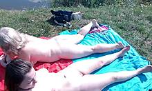 mature mommy and teen girl naked on public beach