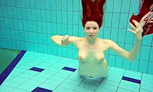 hairy brunette teen marketa swims underwater at pool showing tight beaver pussy