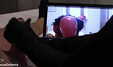 fan watches my vid as i glove-handjob monster cock to massive cumshot