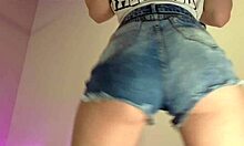 you see how these denim shorts barely cover her big ass cheeks??