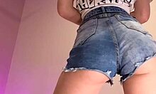 you see how these denim shorts barely cover her big ass cheeks??