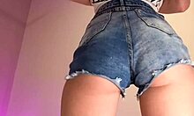 you see how these denim shorts barely cover her big ass cheeks??