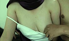 Indo jilbab brunette in white satin dress tempts with huge tits and gets creampied deep inside.
