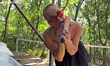 blonde cougar rams big vibrator deep into shaved wet cunt till red and dripping outdoors