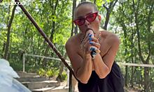 blonde cougar rams big vibrator deep into shaved wet cunt till red and dripping outdoors