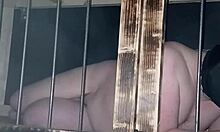 maitresse kantalis locked in club cage carcan for bdsm humiliation play