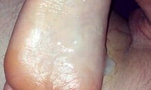 Girlfriend strokes cock with soft feet until cumshot explosion
