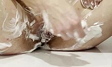 hot babe shaves smooth spot in steamy shower flow