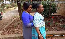 African Milf Lesbians Make Out Passionately at House Party