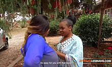 African Milf Lesbians Make Out Passionately at House Party