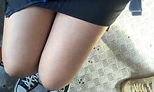 Ela lifts her skirt sans panties on street and bus... watch her tease in public with pigtails and socks.