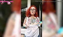 sexy redhead teen babe in wet t-shirt washes windows showing horny big tits homemade