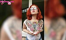 sexy redhead teen babe in wet t-shirt washes windows showing horny big tits homemade