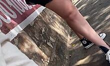 Ela lifts her skirt sans panties on street and bus... watch her tease in public with pigtails and socks.