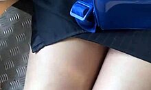 Ela lifts her skirt sans panties on street and bus... watch her tease in public with pigtails and socks.