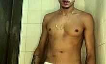 novinho strokes his thick cock hard in the steamy shower punheta