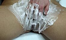 hey, shaving hairy pussy with watermelon foam in bathroom closeup