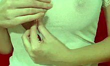 Pretty blonde in see-through dress bounces huge fake tits close-up amateur