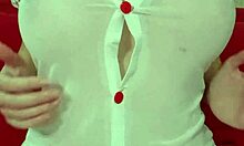 Pretty blonde in see-through dress bounces huge fake tits close-up amateur