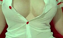 Pretty blonde in see-through dress bounces huge fake tits close-up amateur