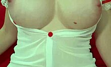 Pretty blonde in see-through dress bounces huge fake tits close-up amateur