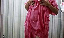 peeking busty brunette bathing in sheer satin dress lingerie tease